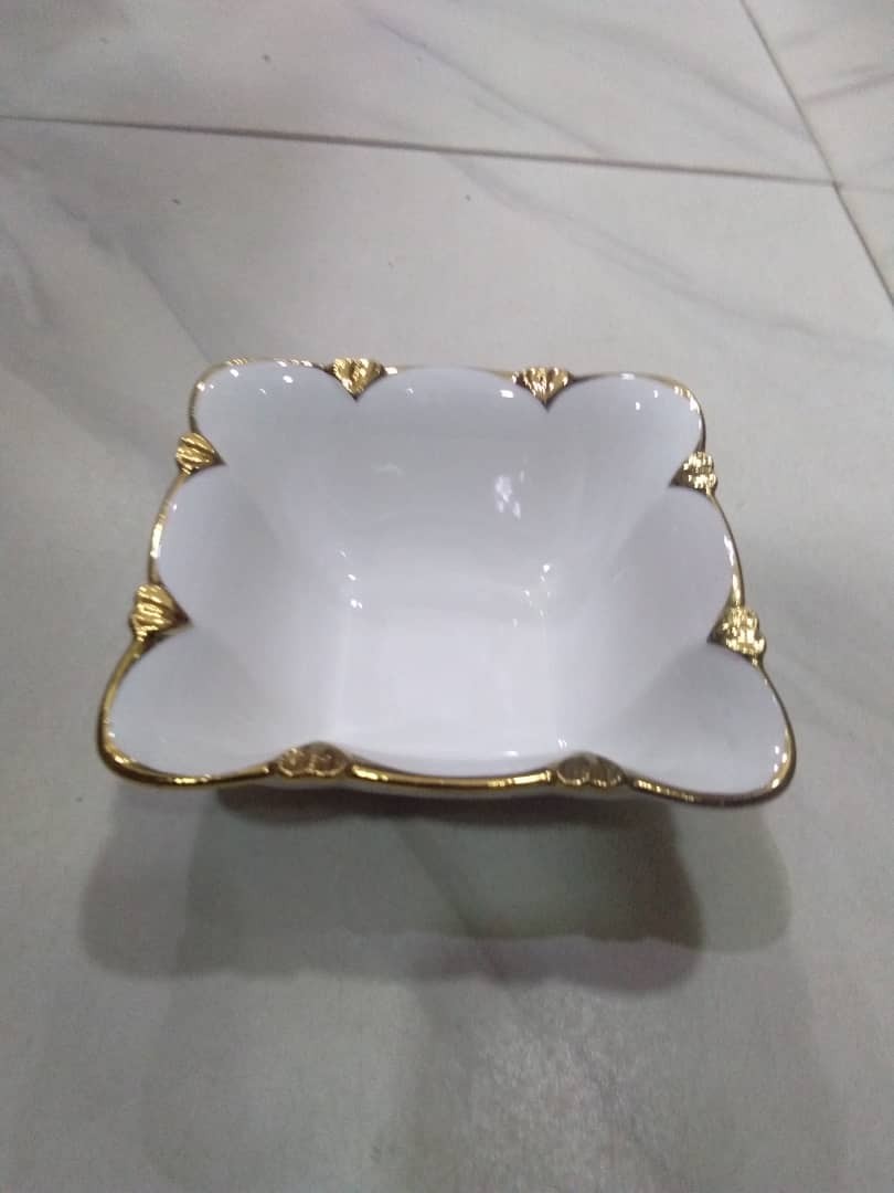 Gold and white ceramic bowl love design